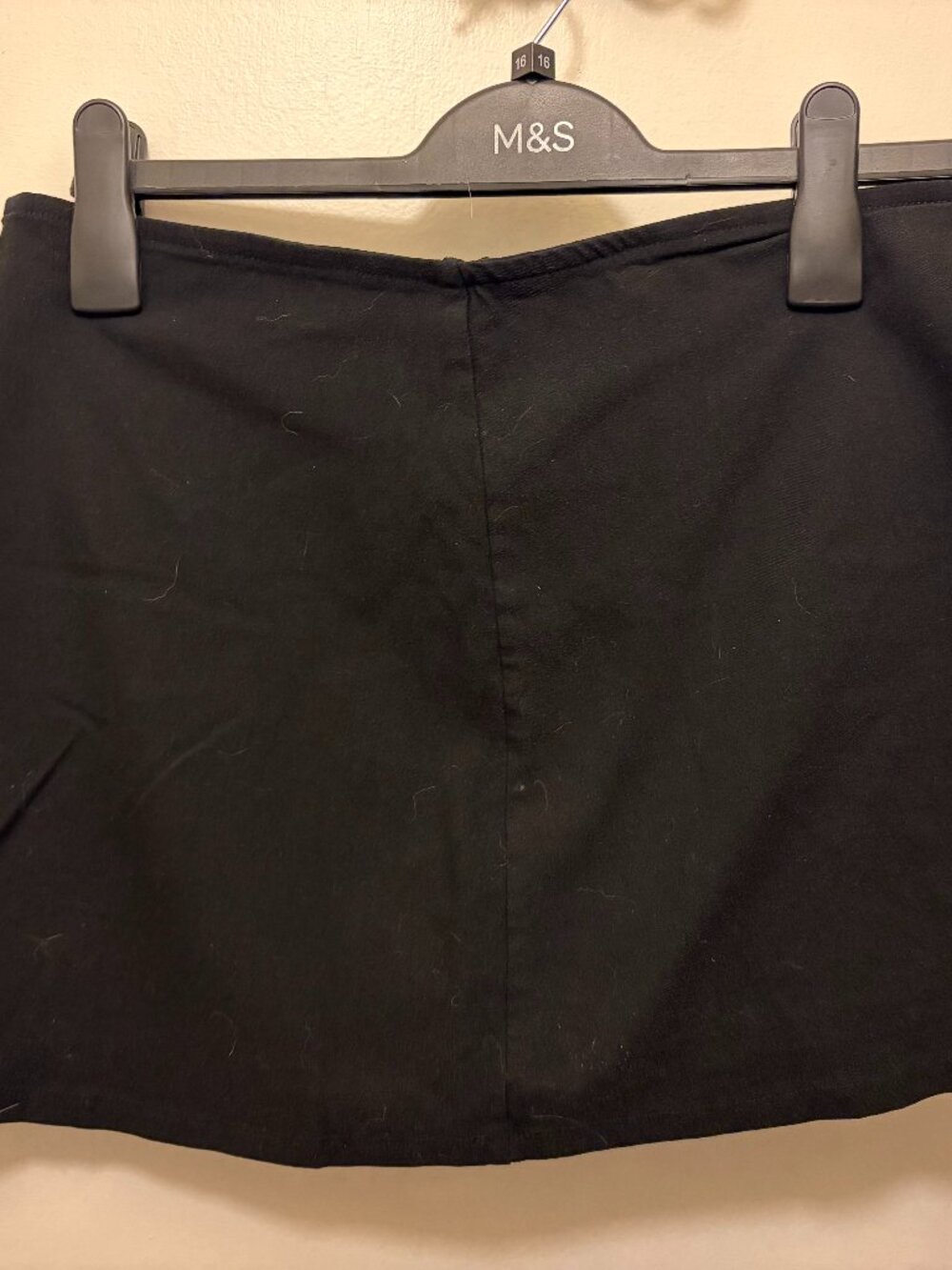 Black mini skirt with shorts underneath